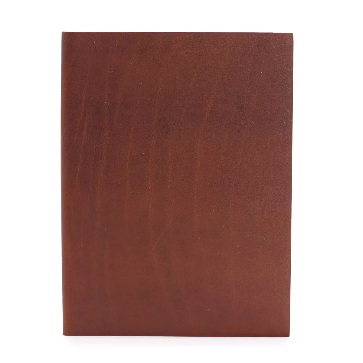 Large dark tan 20x15cm notebook open to lined pages showing ruled lines and a stitched spine binding