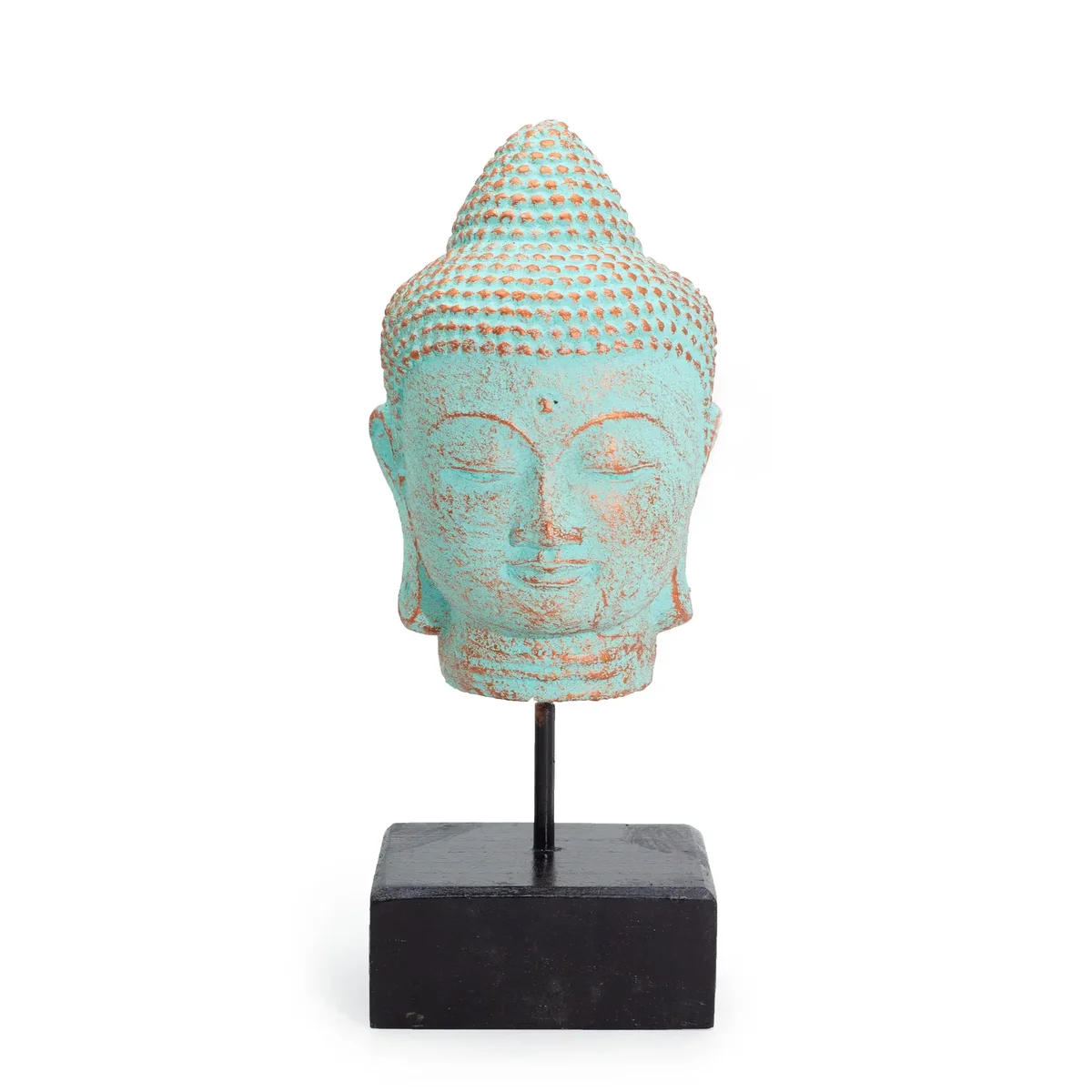 Green copper Buddha head sculpture on a stand symbolizing stillness and calm for home decor