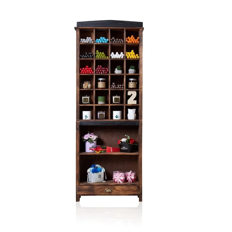 brownwashed wooden candle display stand holding a single candle