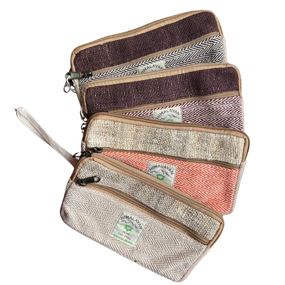 Assorted hemp phone zip pouches with zip closure for phone, tobacco, or small items on white background