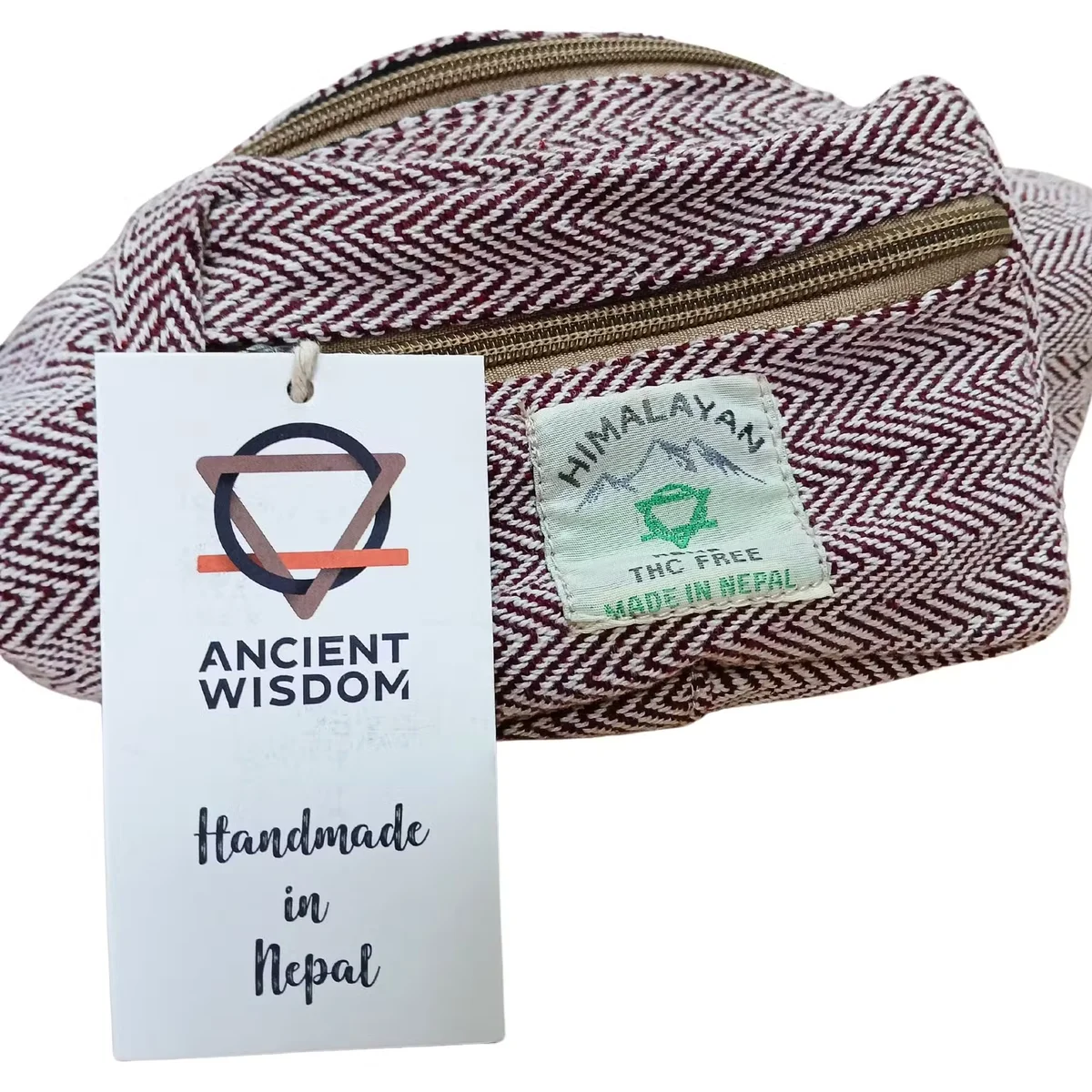 Wine-coloured cotton hemp belt bag for women shown from the front with adjustable strap and zippered pocket