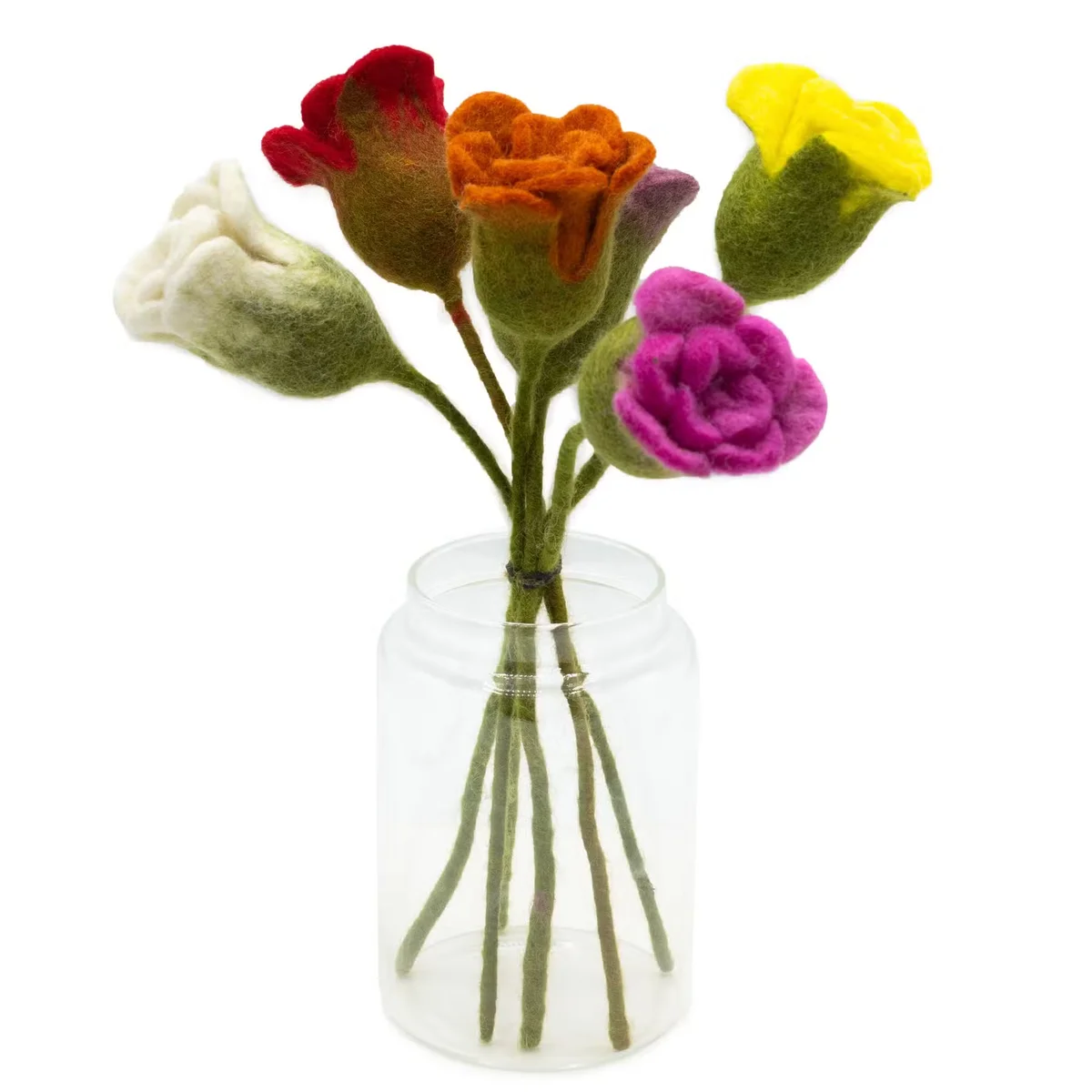 Assorted coloured decorative felt flowers shaped like roses arranged closely together on a plain background