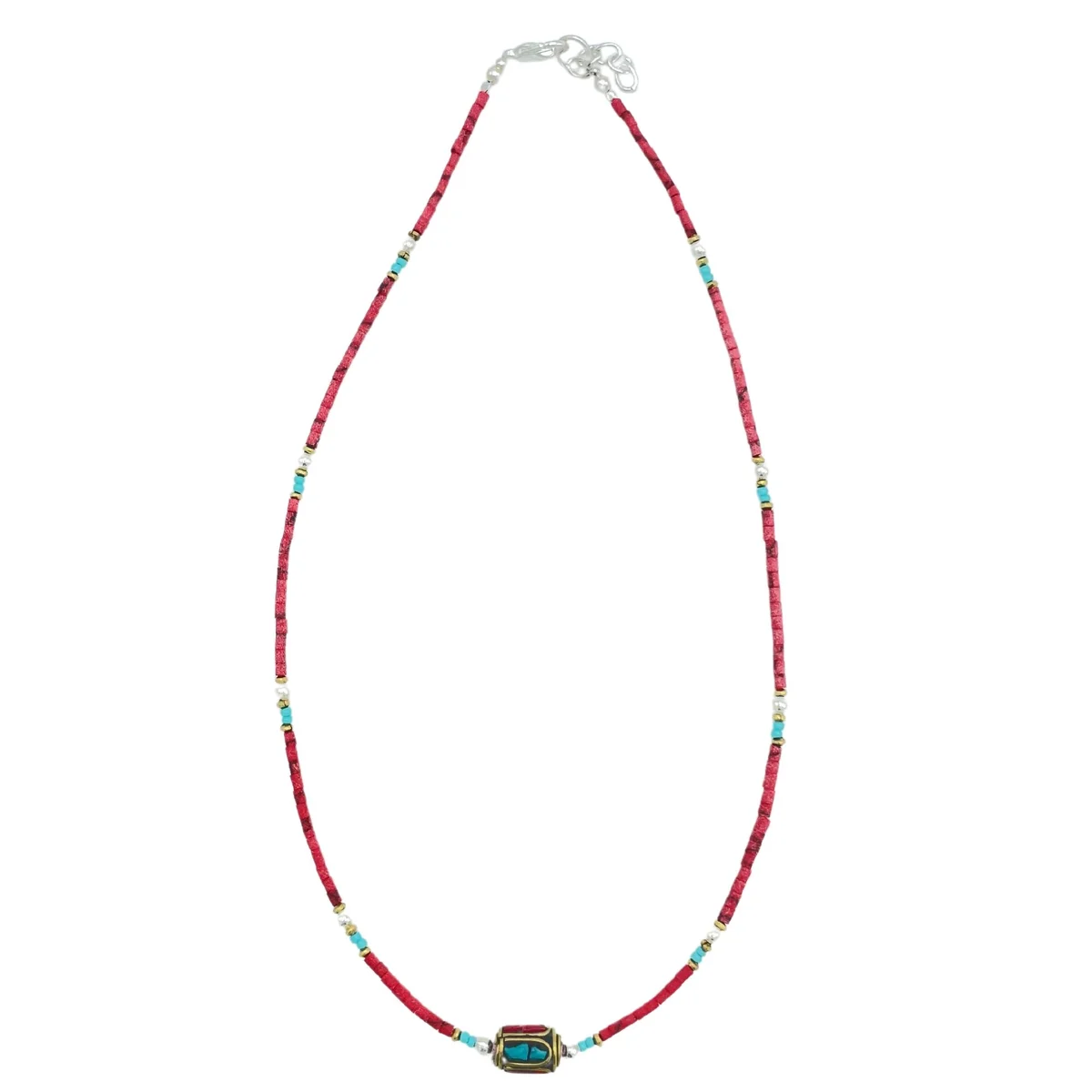 Nepalese gem necklace featuring extra fine coral tribal beads on a string against a white background