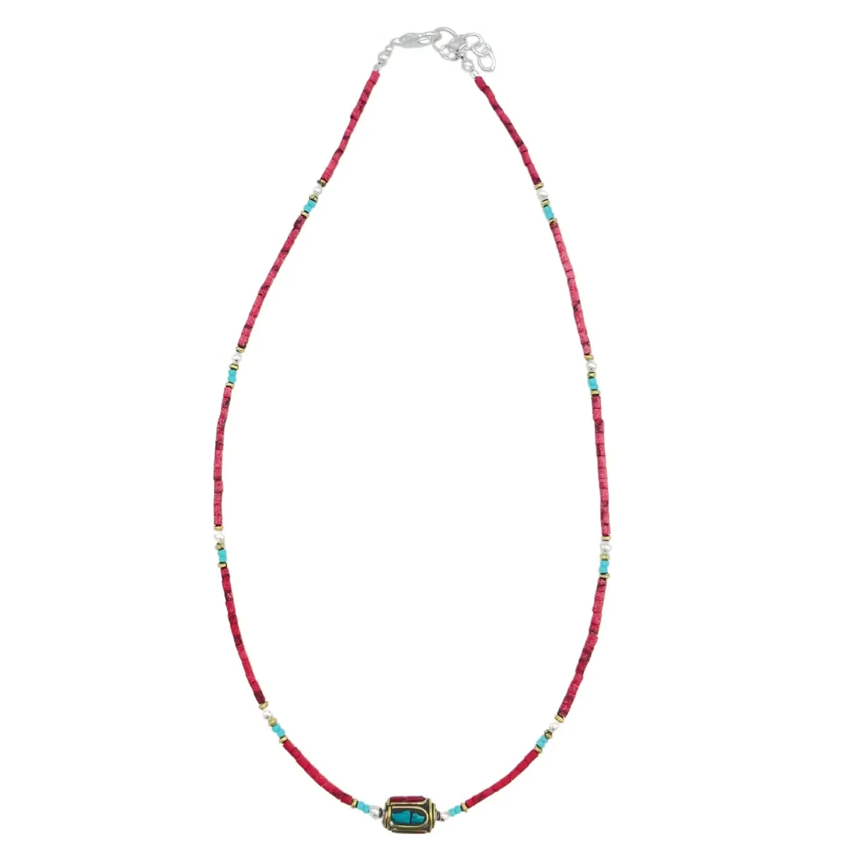 Close-up of Nepalese extra fine gem necklace with vibrant coral tribal beads on white background