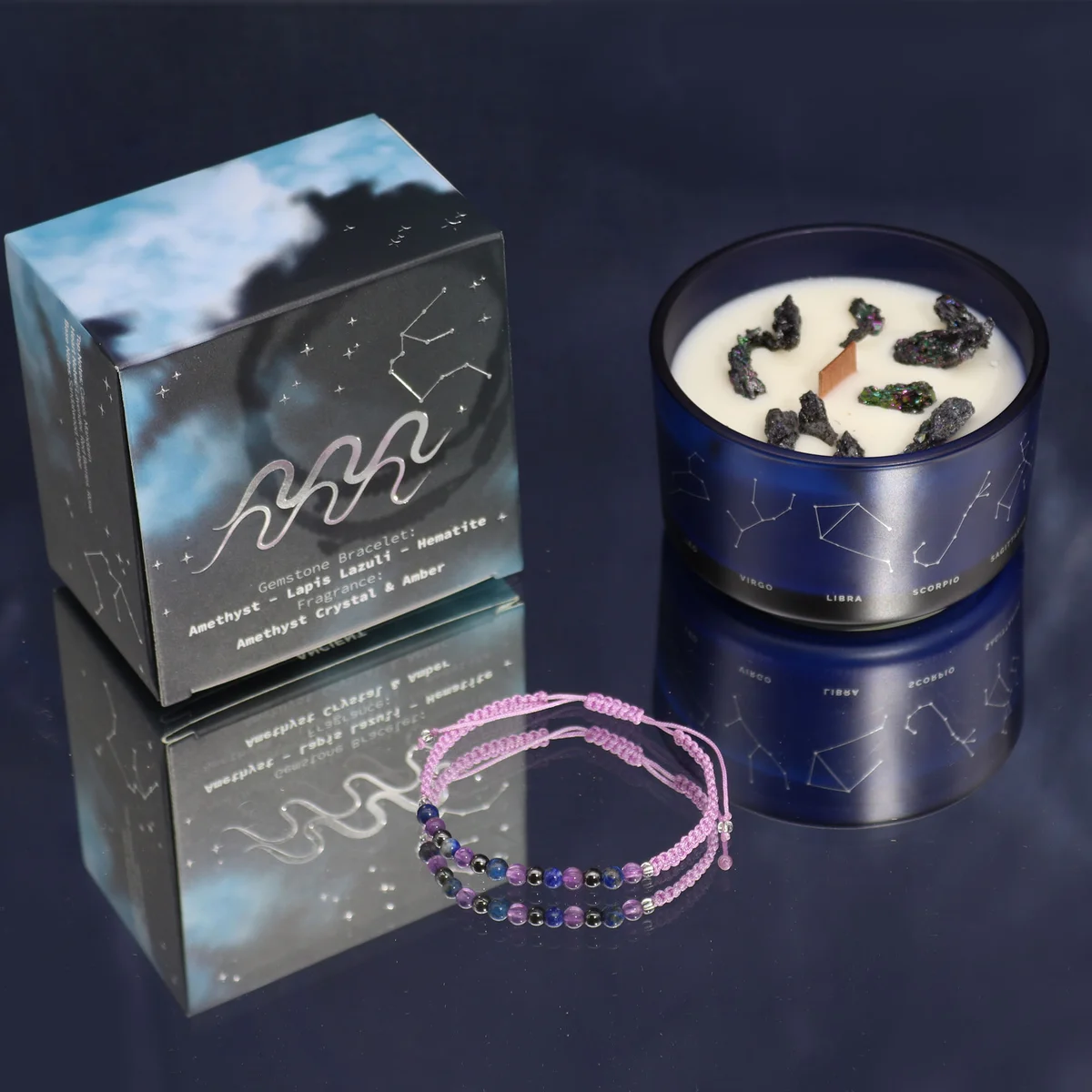 Aquarius candle gift featuring a zodiac crystal candle and a matching gemstone bracelet on a white background