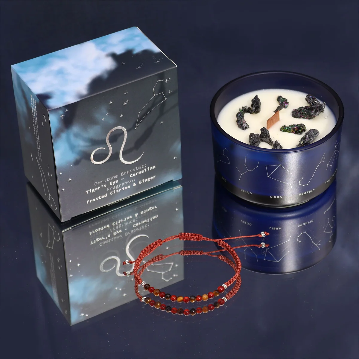 Zodiac crystal candle with Leo sign and accompanying gemstone bracelet displayed on white background