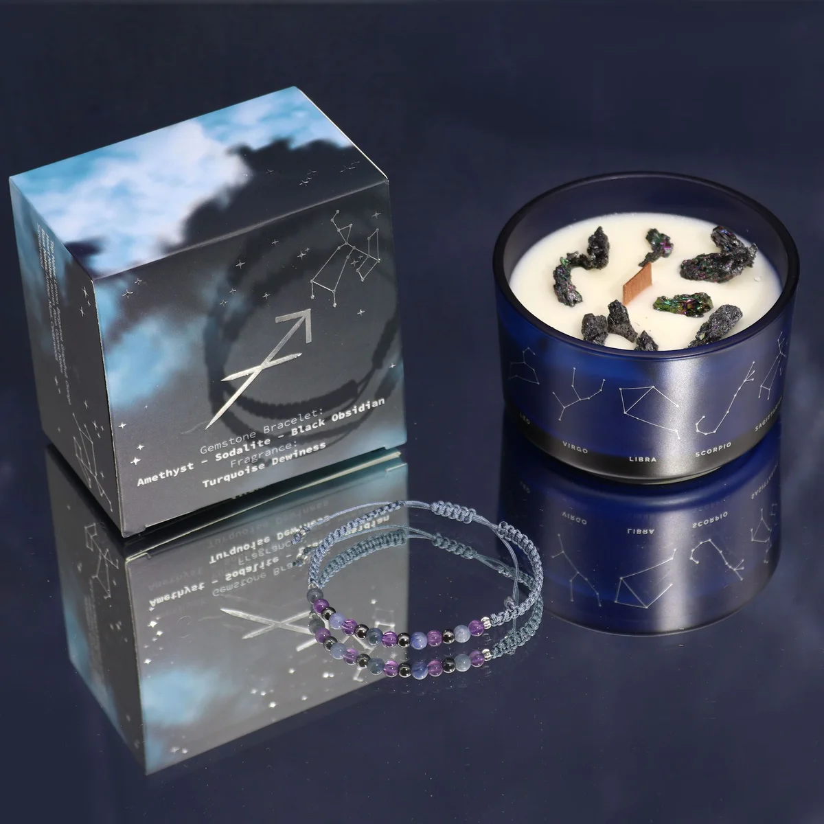Zodiac crystal candle with Sagittarius label and a matching gemstone bracelet wrapped around the jar
