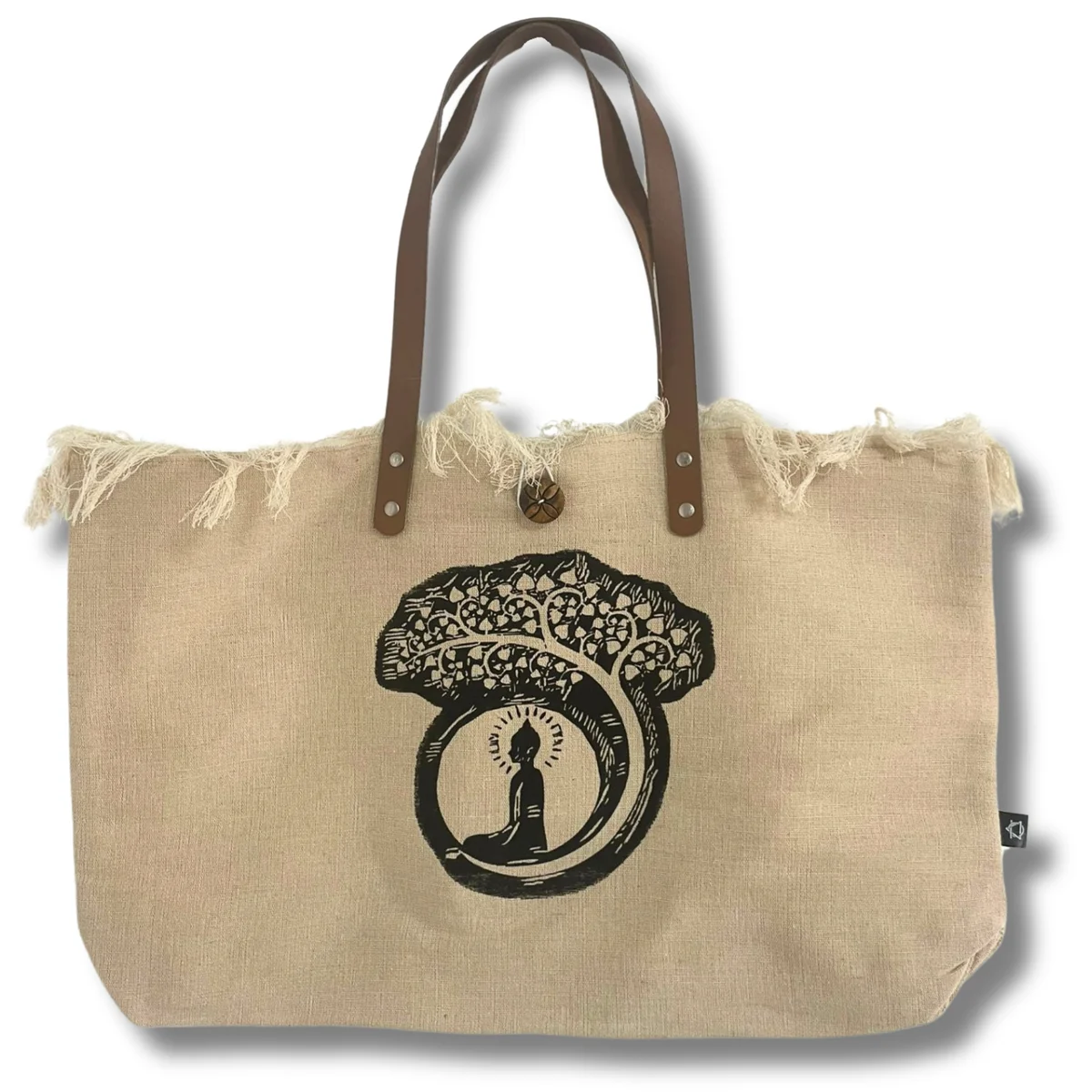 Natural tote bag with leather handles featuring Buddha design, shown hanging against a white background, Buddha tote bag