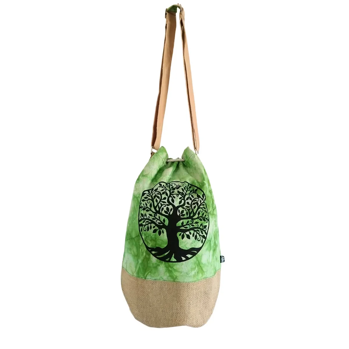 Green stonewash all natural backpack featuring a Tree of Life design, shown from the front with straps visible