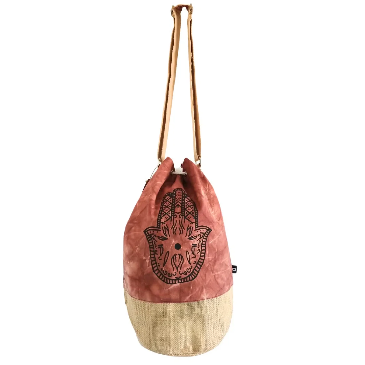 Terracotta stonewash Hamsa backpack showing front pocket and natural fabric texture on white background