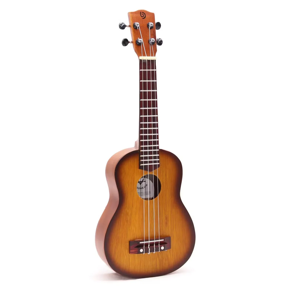 Handcrafted ukulele with orange sunburst finish showing body and four strings on wooden surface