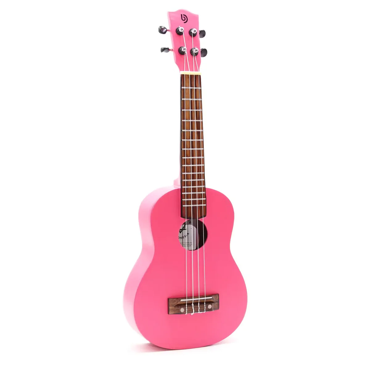 Bright pink artisan made ukulele with four strings shown from the front on a white background