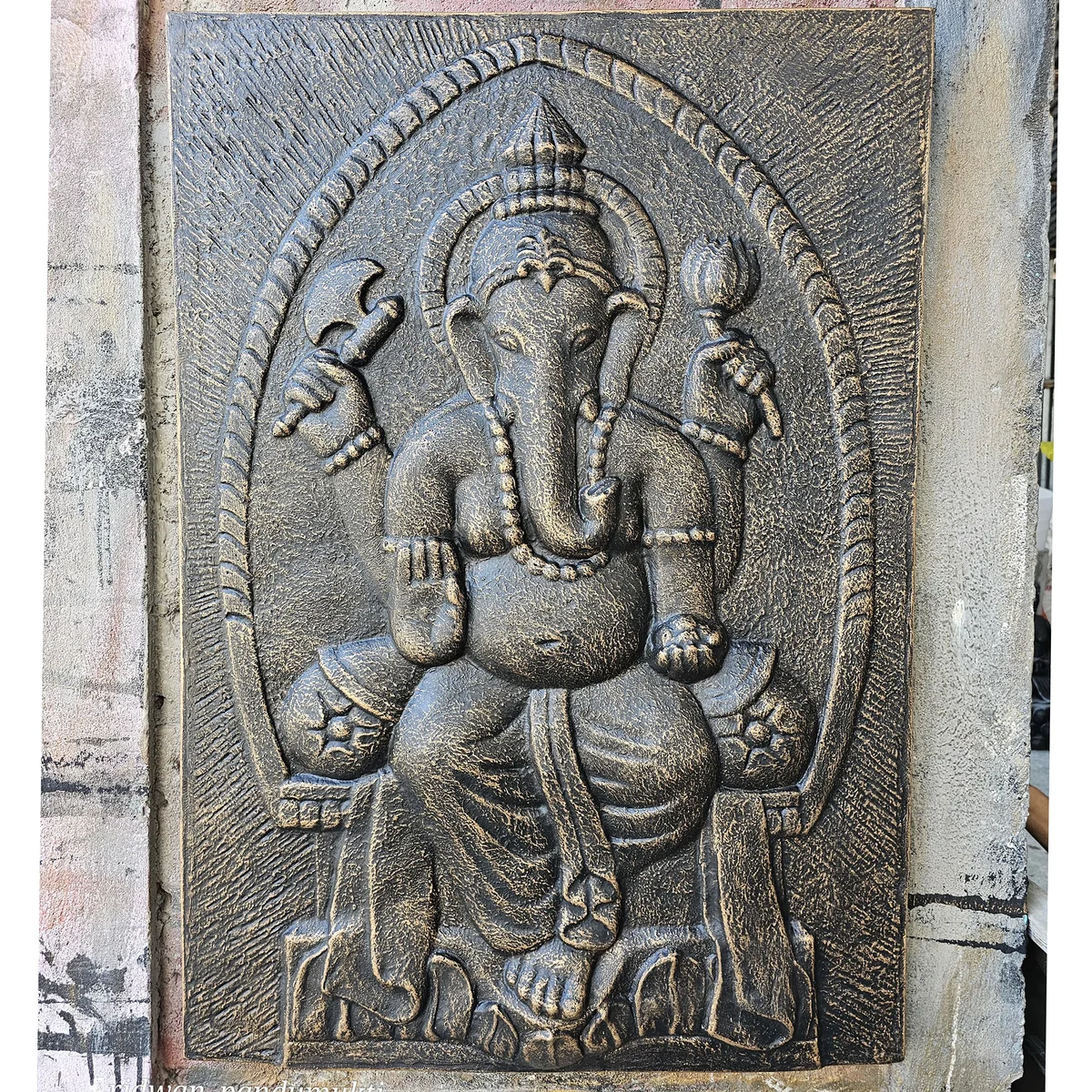 Large antique gold relief Ganpati with iron frame Ganpati decor measuring 0.7 by 1 meter on white background