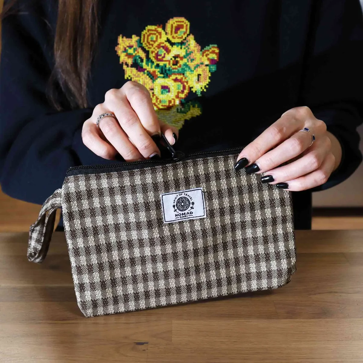 Soft natural handy gift pouches in assorted materials, 20x13cm, shown in a loop.