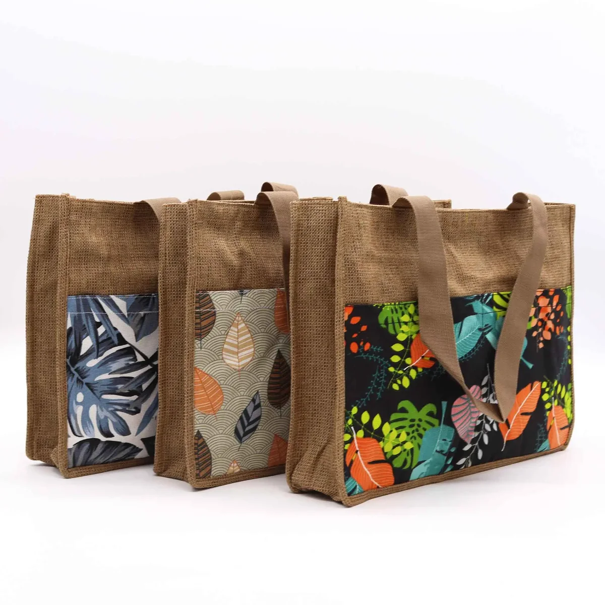 Assorted design shopping bag displaying tropical market prints in a vibrant colorful array.