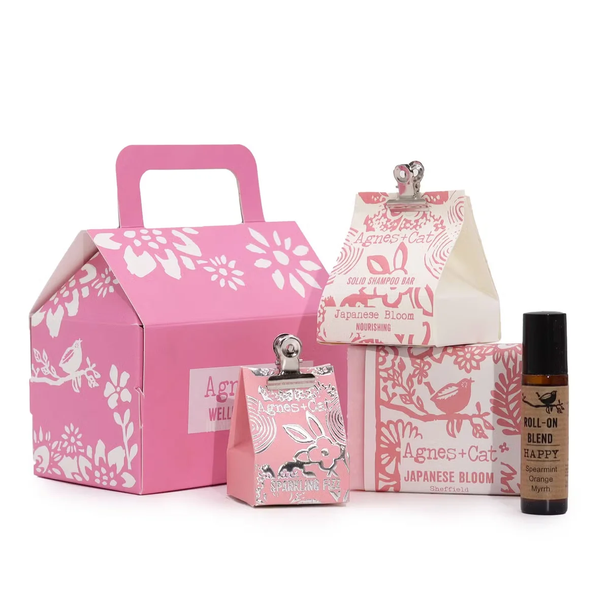 Agnes + Cat Bloom & Bliss aromatherapy gift set with wellness products arranged on white background