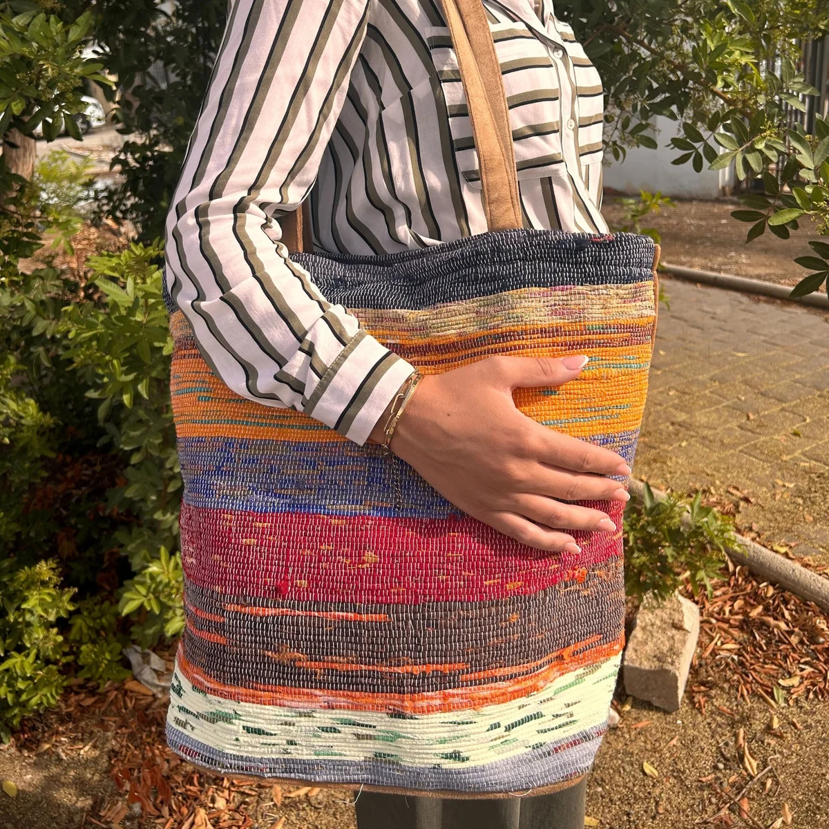 Recycled big rug bag in shades of mushrooms.