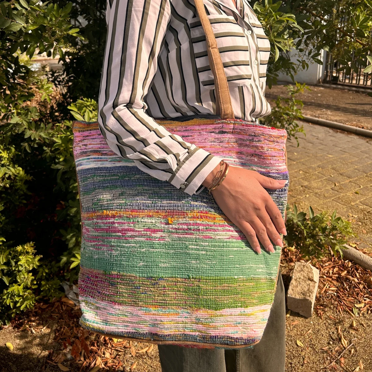 Recycled big rug bag in earthy dusk tones, shown open with bag straps, eco friendly tote bag