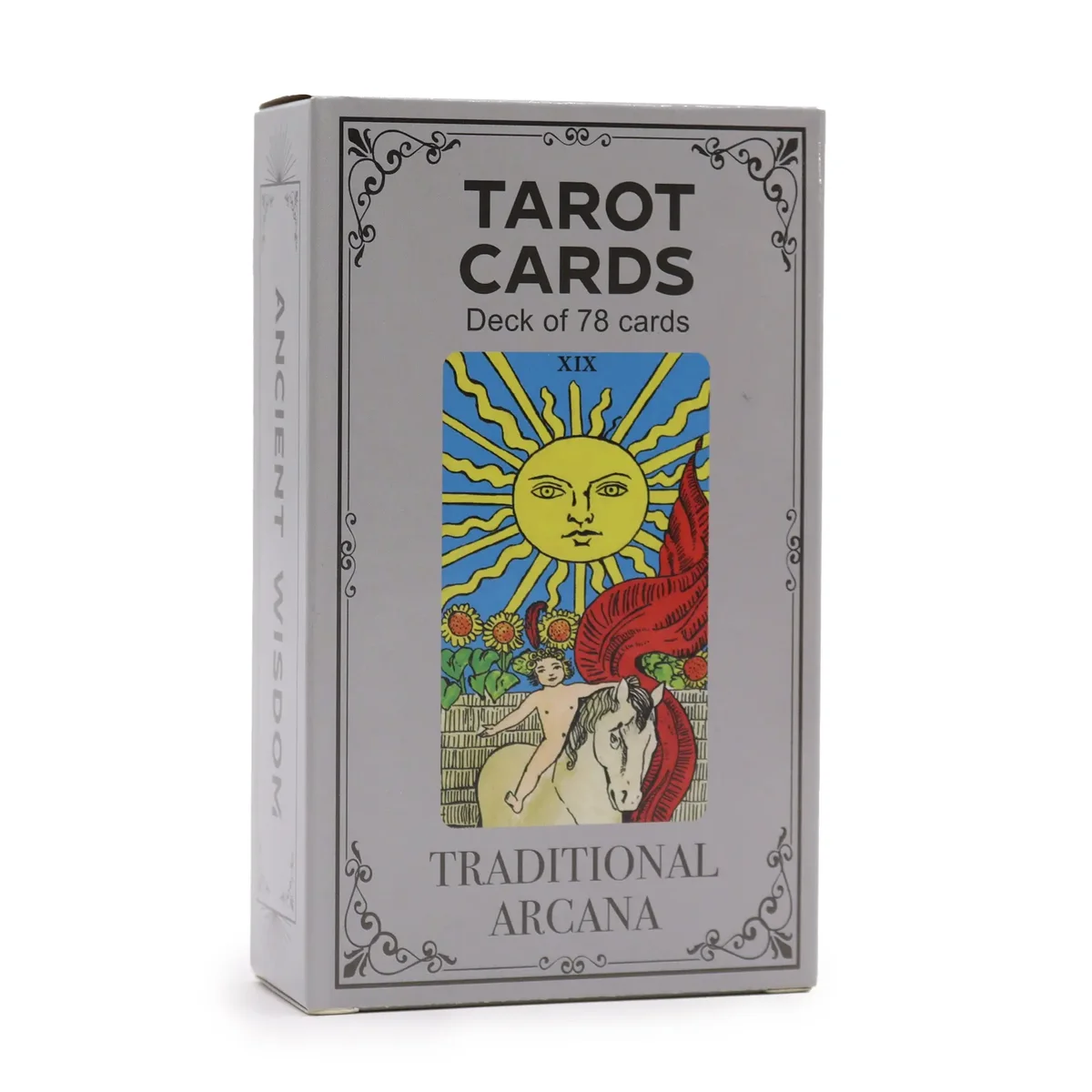 Tarot cards with guide book displayed on a table.