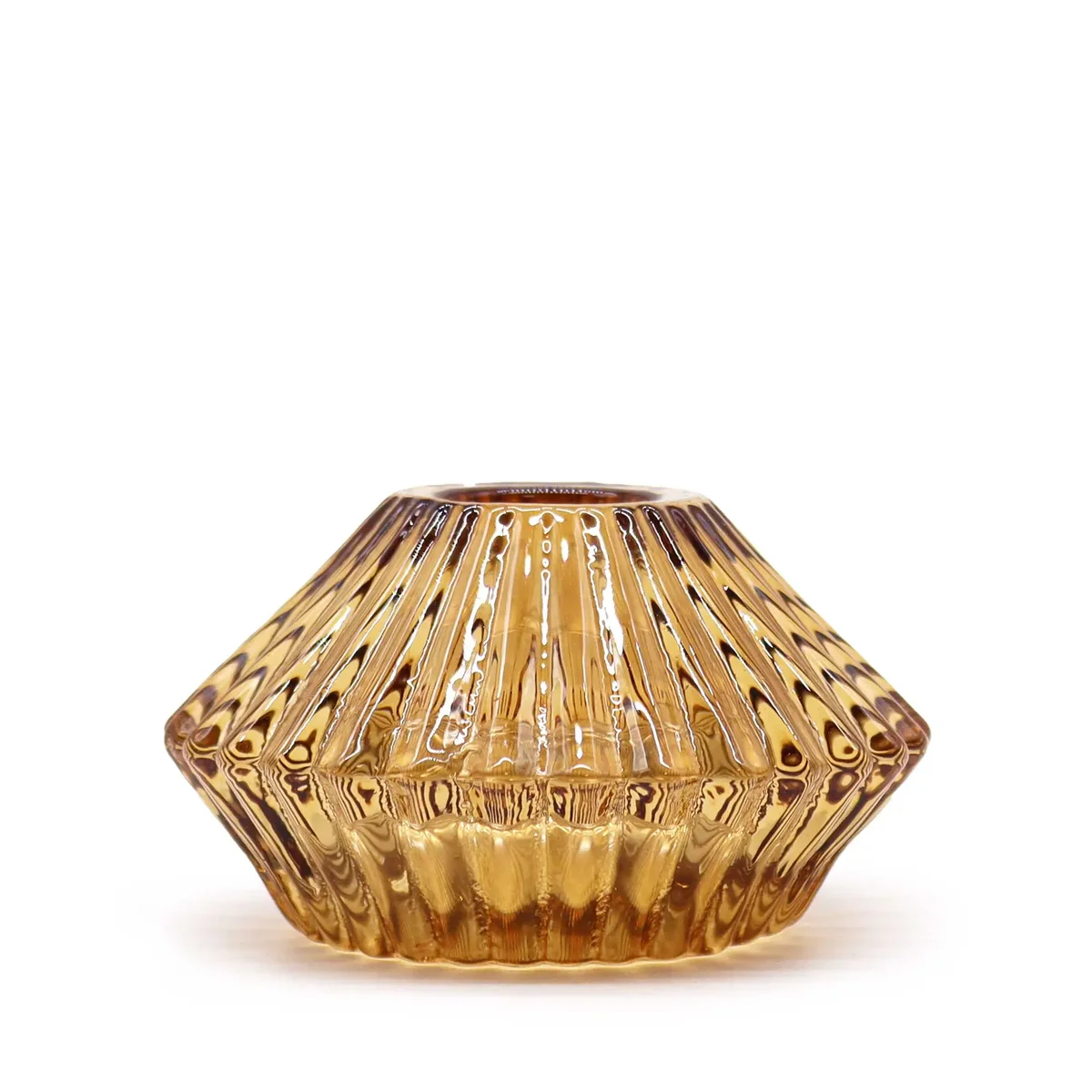 Tealight candle holder in antique amber with a stylised flower flip design.