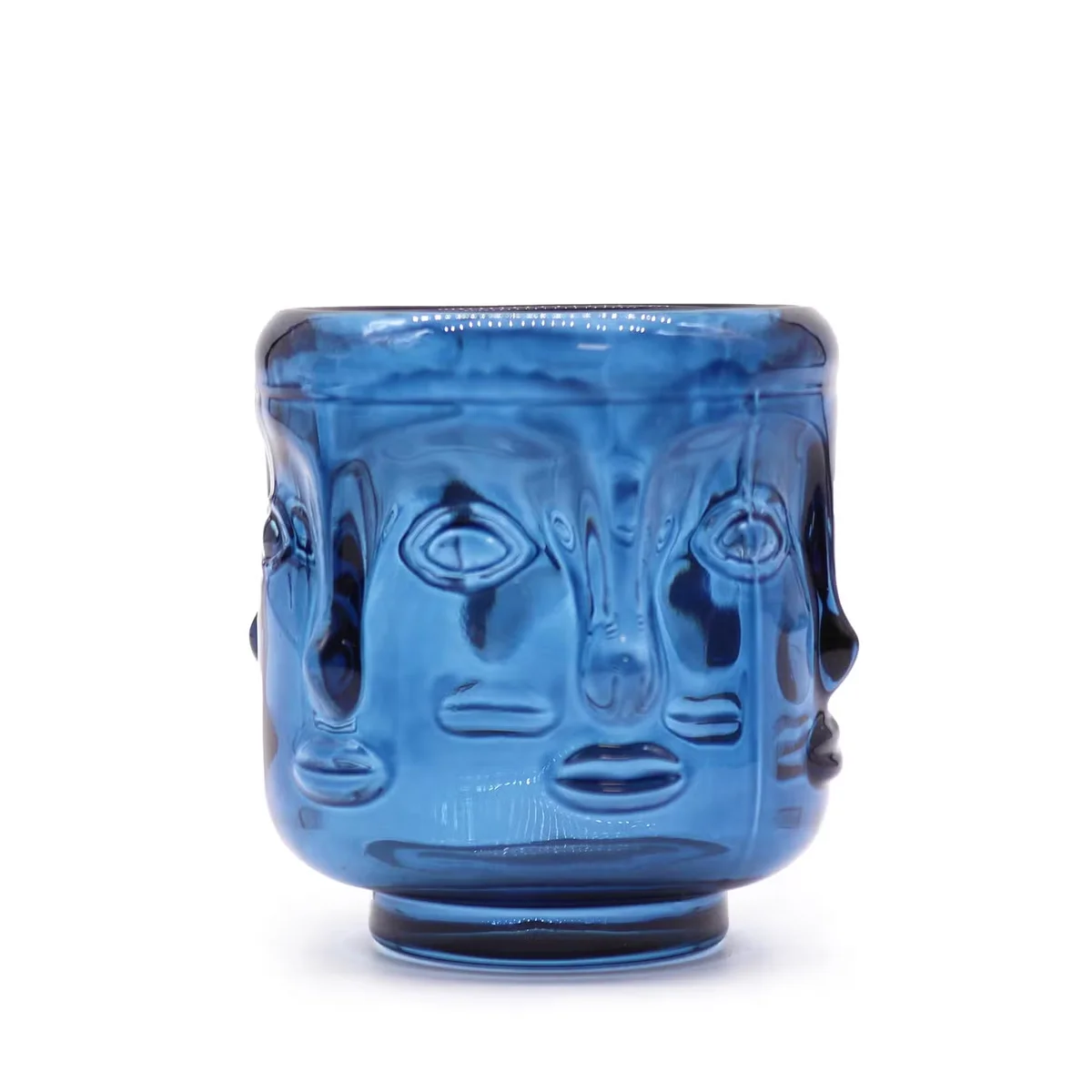 Royal blue Buddha face candle jar with intricate Buddha face design.