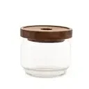 7cm glass jar with bamboo lid, smooth glass body, shown in natural light.