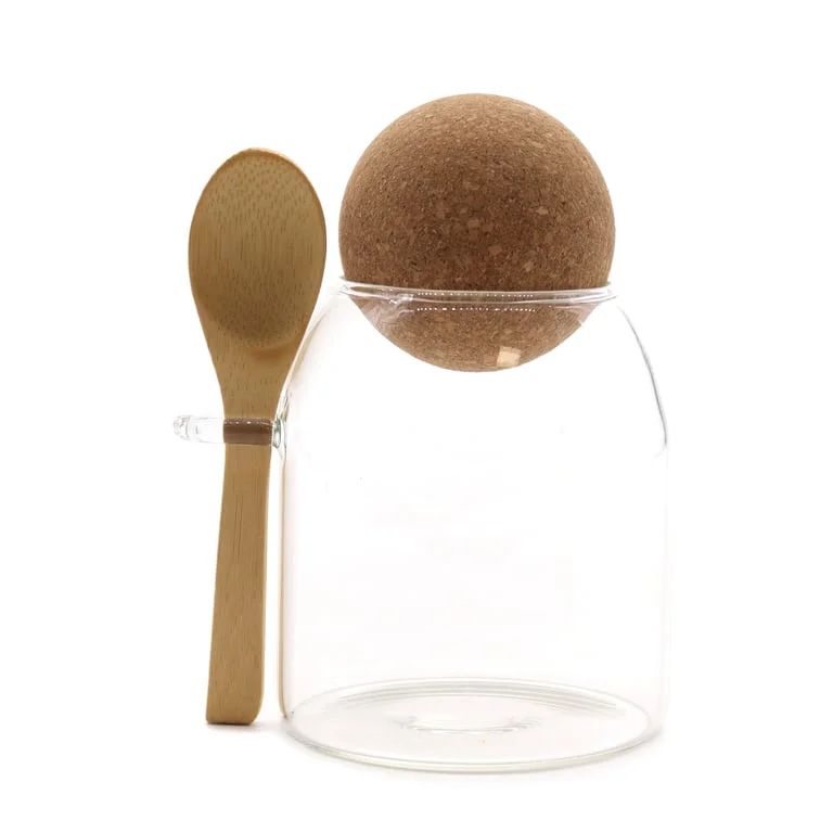 Clear 10cm glass jar with cork ball and spoon inside, a stylish cork ball glass jar.
