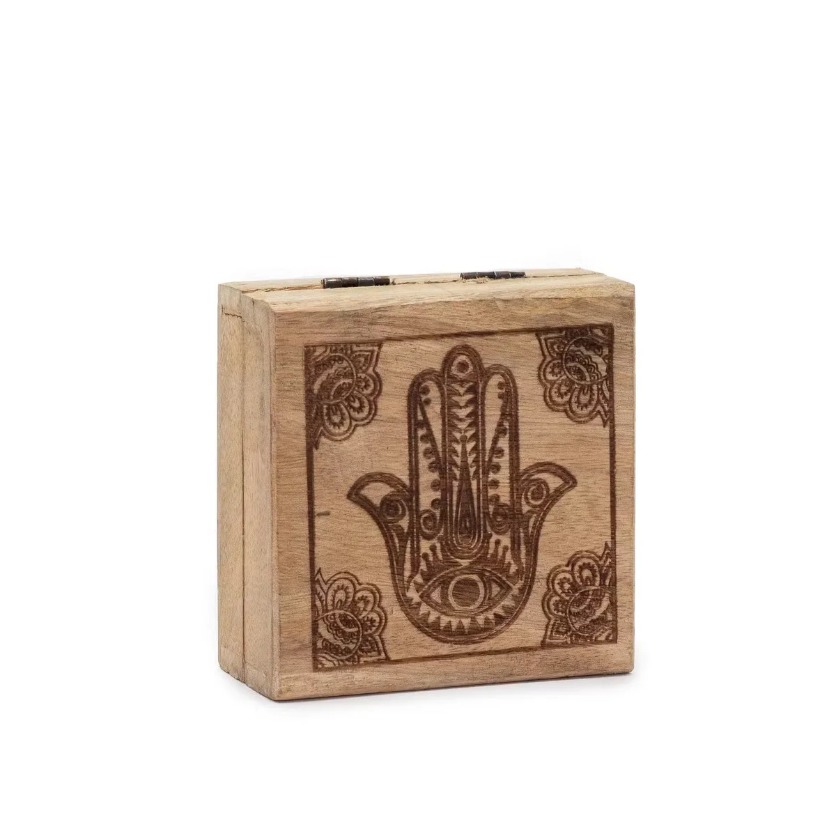 Black engraved box with hamsa symbol on a small square box
