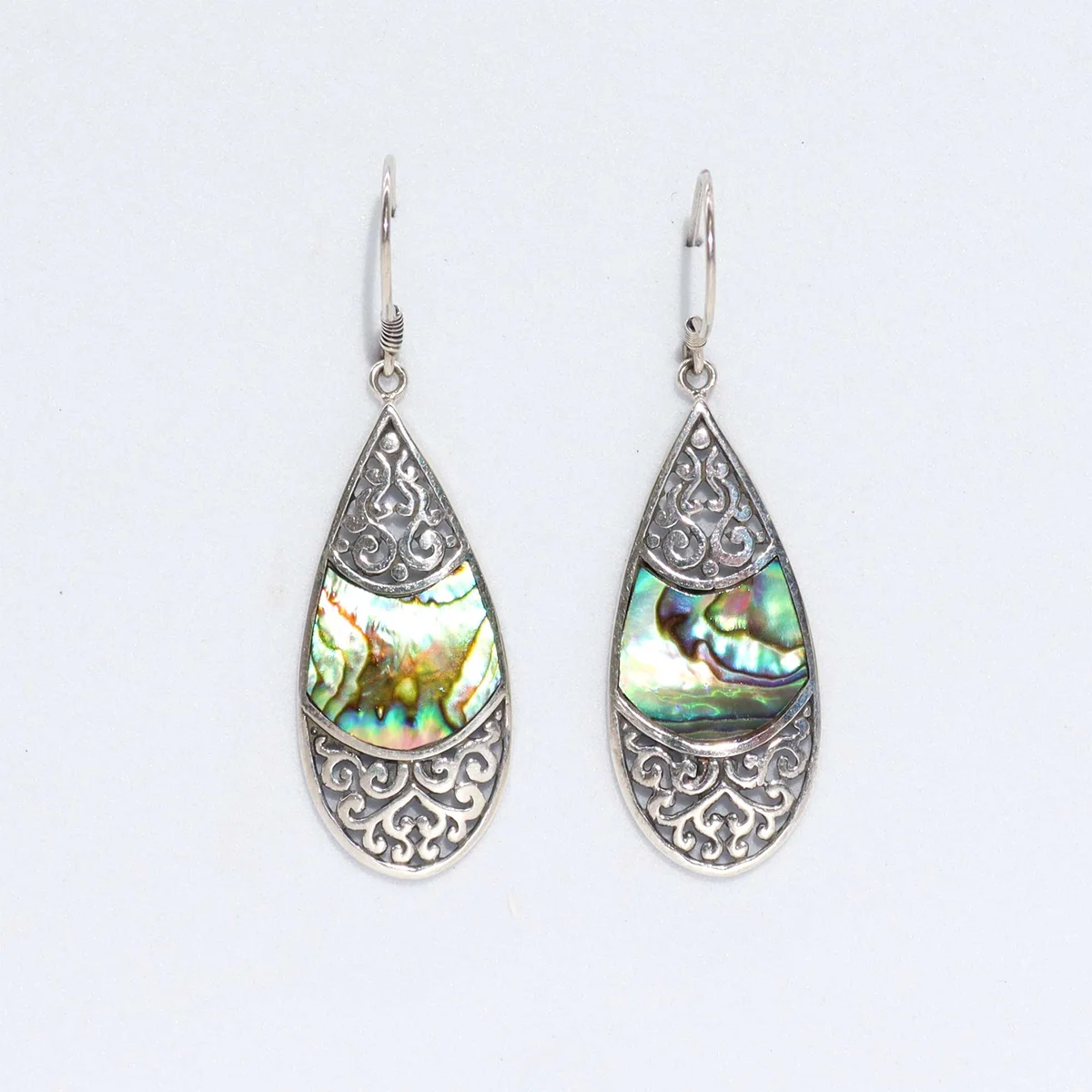 Abalone shell earrings: teardrop oval shells set in silver.