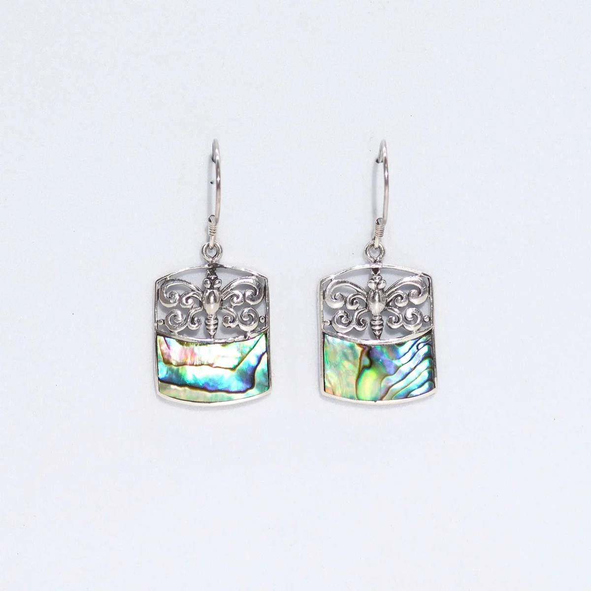 Elegant shell silver earrings featuring a dragonfly design with abalone accents
