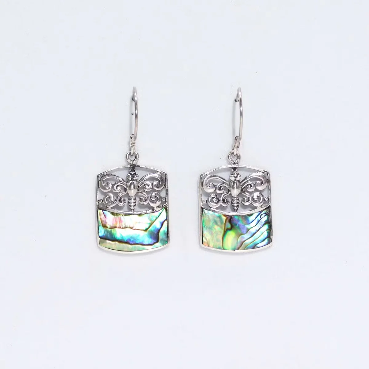 Silver dragonfly earrings with abalone shell—a stylish silver earrings UK set.