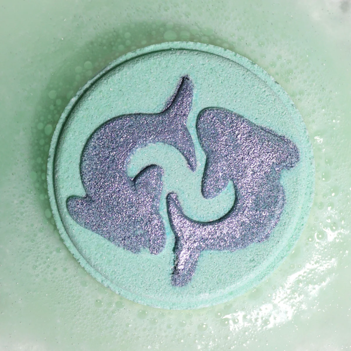 Set of Pisces horoscope bath bombs arranged with zodiac symbols on a white background for relaxation and self-care