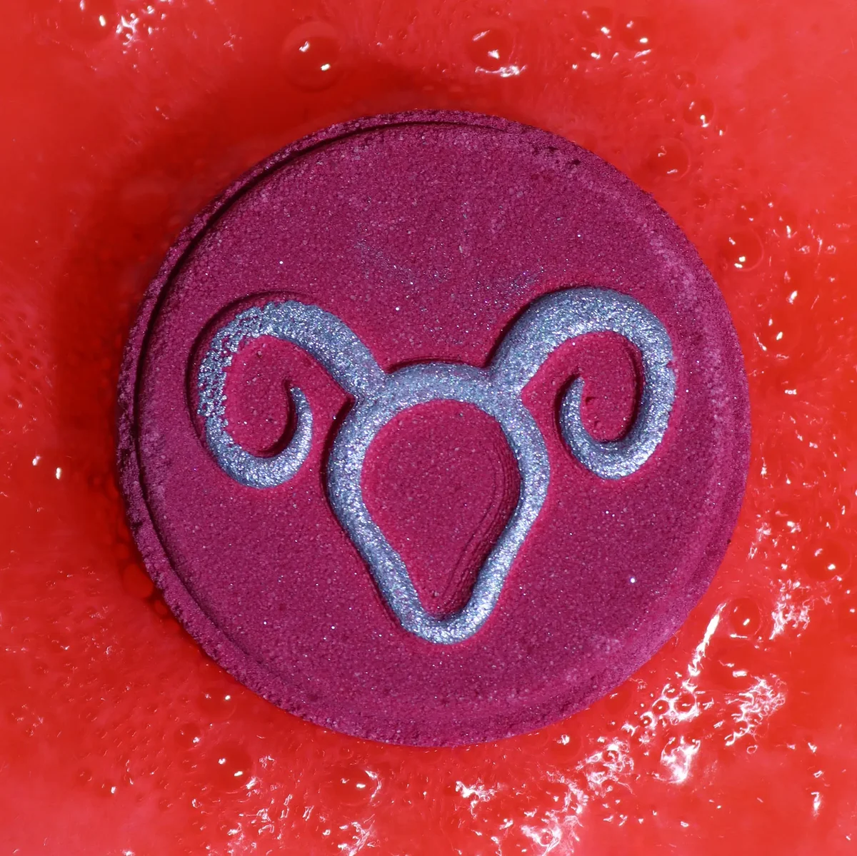 Aries bath bombs set featuring zodiac horoscope symbols, ideal for a relaxing bubble bath