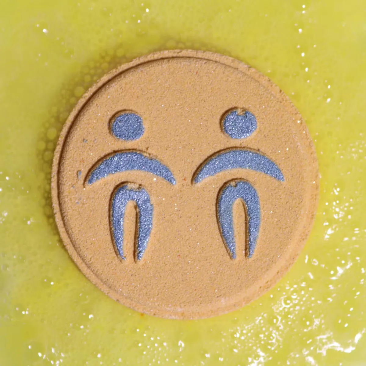 Set of Gemini zodiac bath fizzers with horoscope symbols displayed in a zodiac bath set packaging