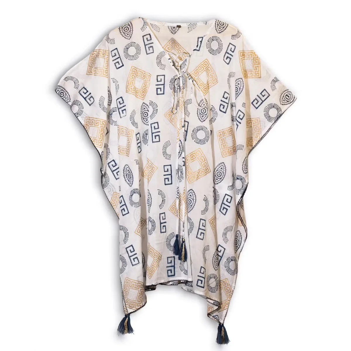 Gold print kaftan featuring blue fabric with Greek motif.