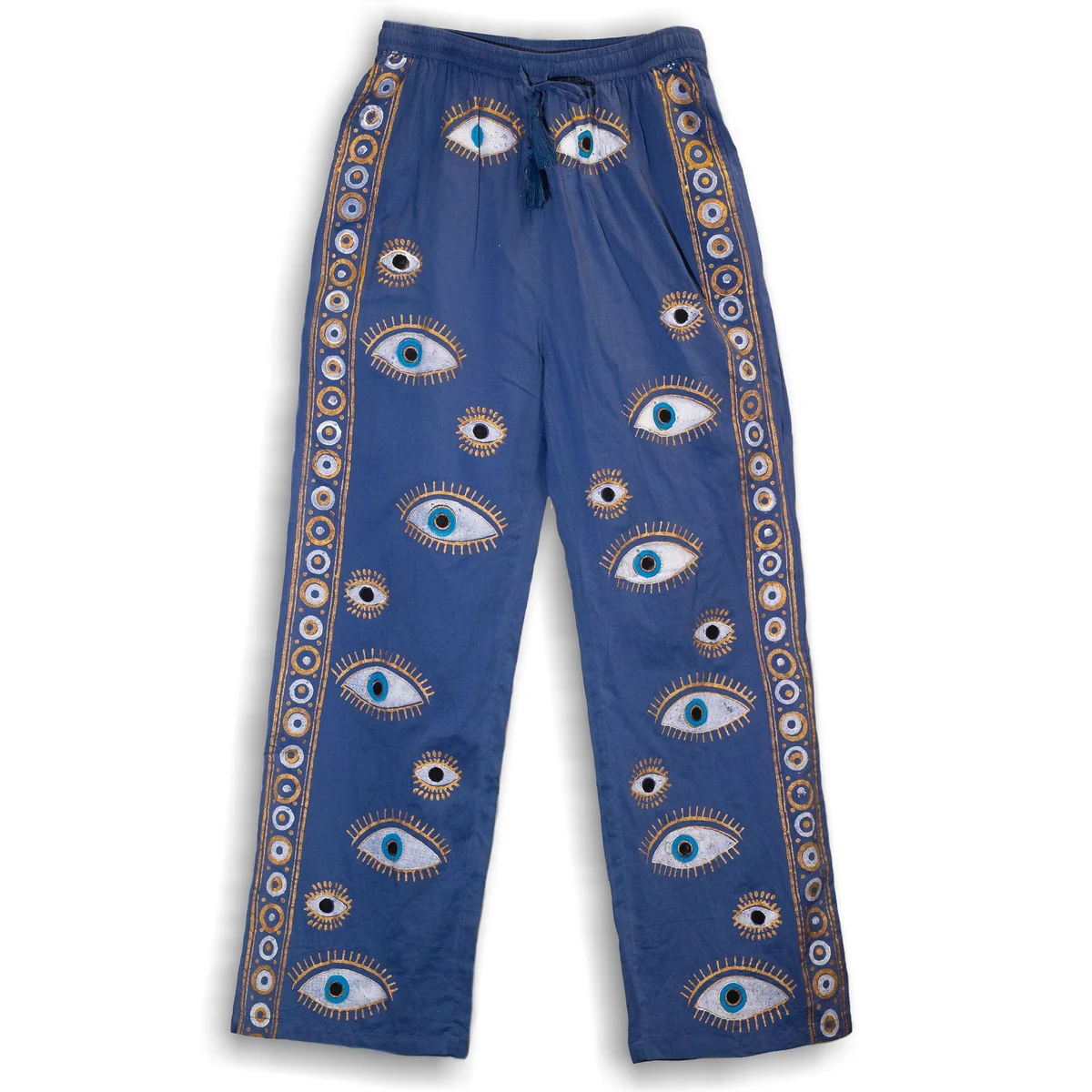 Nomad Sari lounge pants in rich blue with hand‑painted gold evil eye accents.
