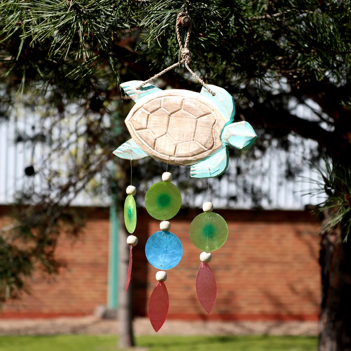Aqua-themed decorative turtle carving with Copis Drop in a ceramic set.
