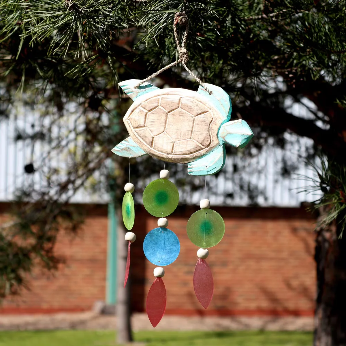 aqua decor ornament of a blue turtle carving with a drop shape, perfect for water or indoor décor.