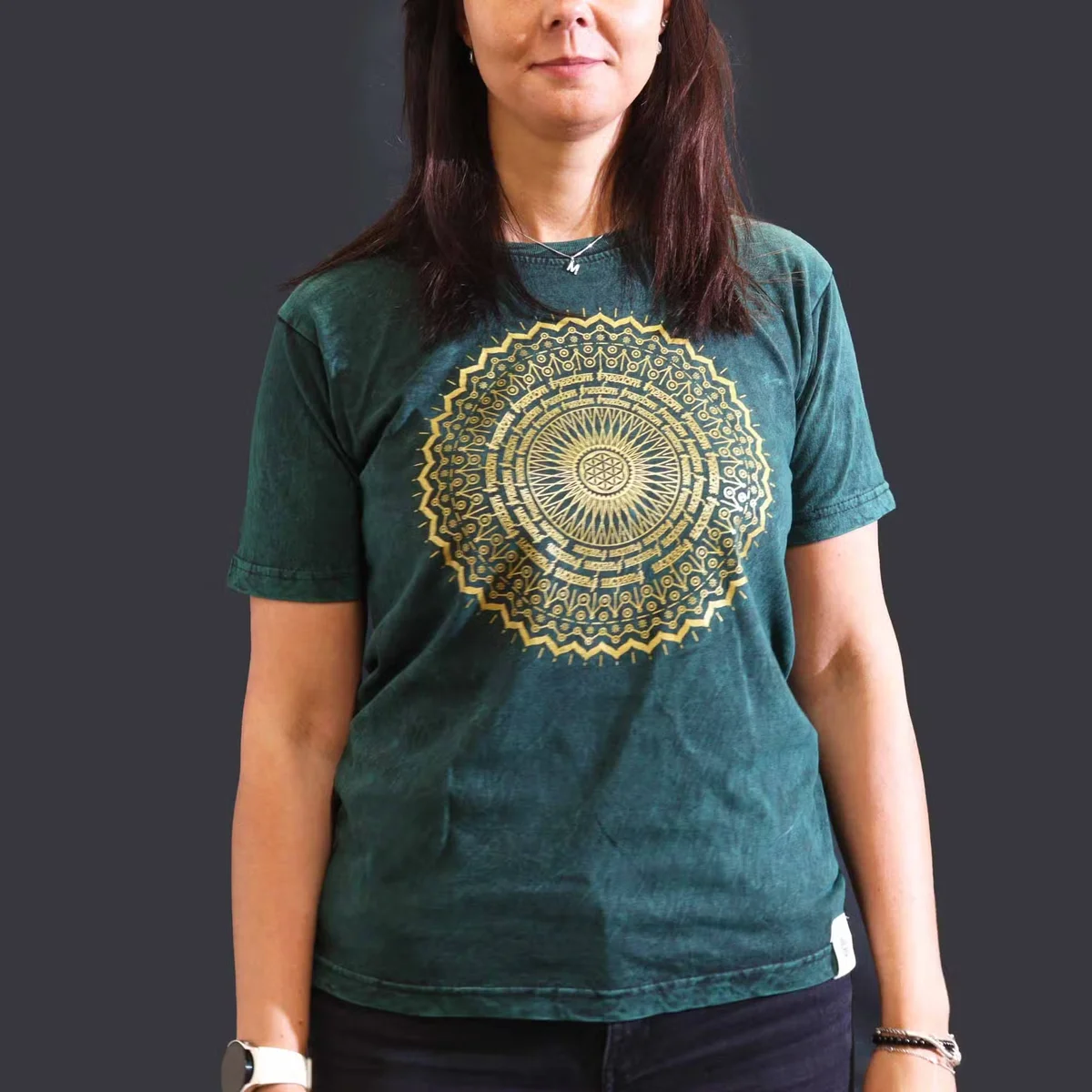 Green medium stone washed casual mandala t-shirt laid flat showing front mandala design and short sleeves