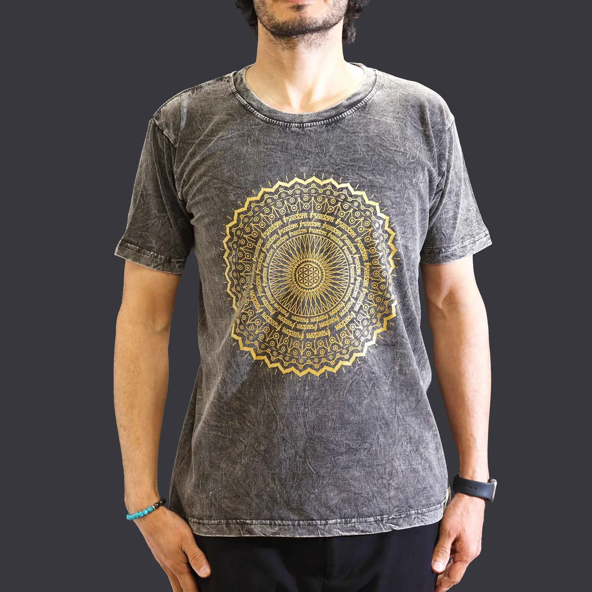 Dark grey medium stone washed mandala print t-shirt laid flat showing front design and texture details
