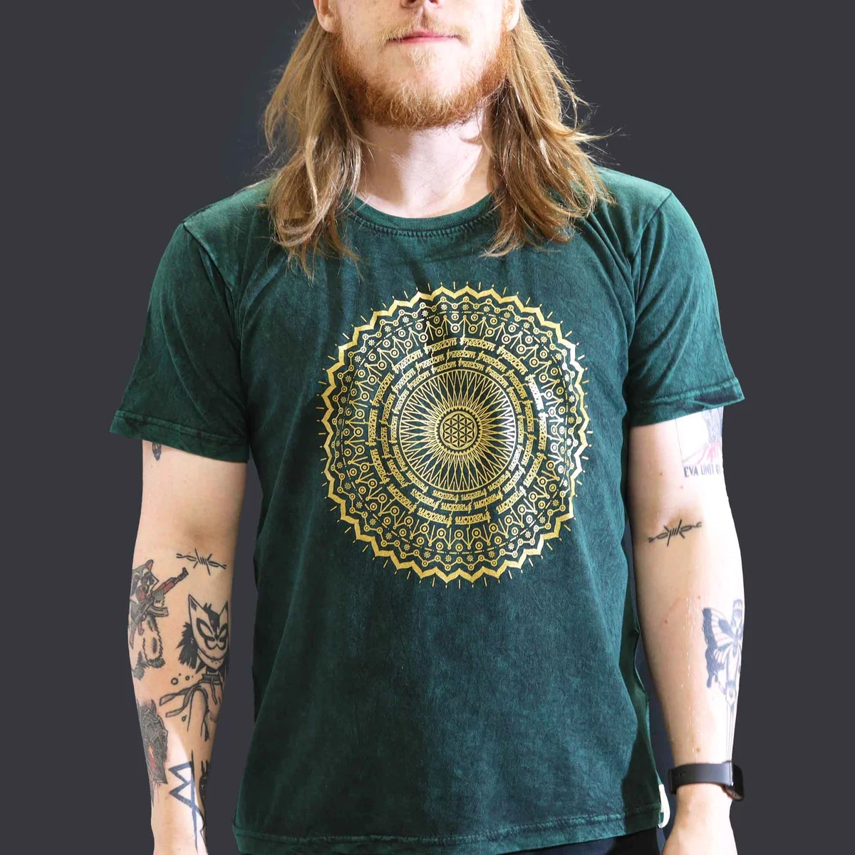 Green stone washed tee with large mandala design on front, relaxed fit, short sleeves, displayed on plain background