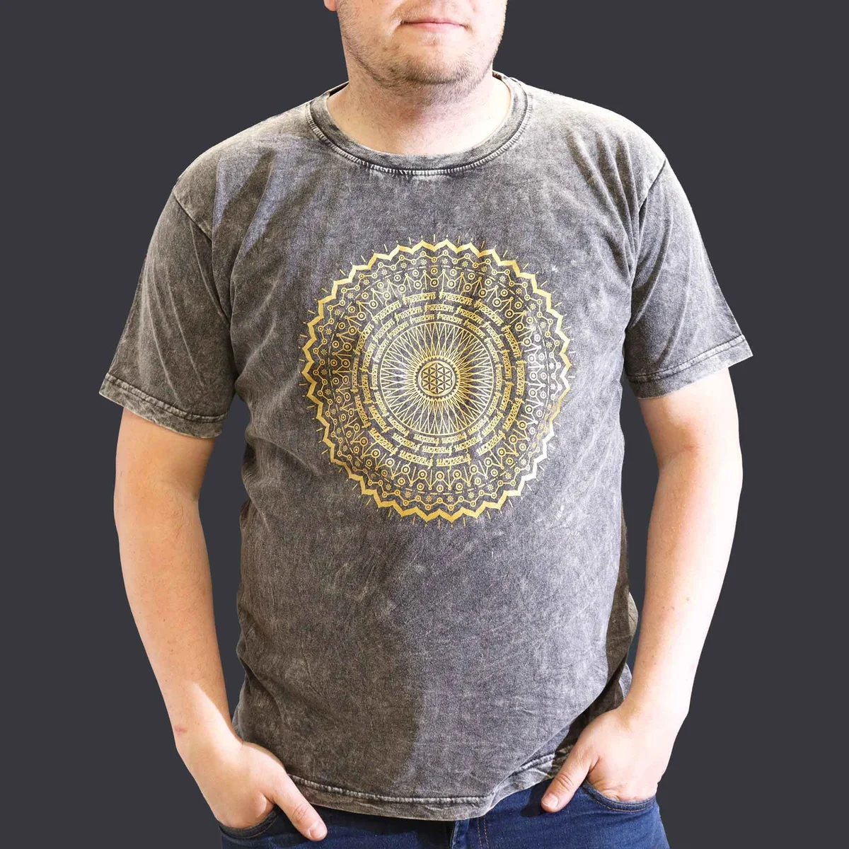 Dark grey XLarge stone washed t-shirt with mandala design on front, laid flat against white background