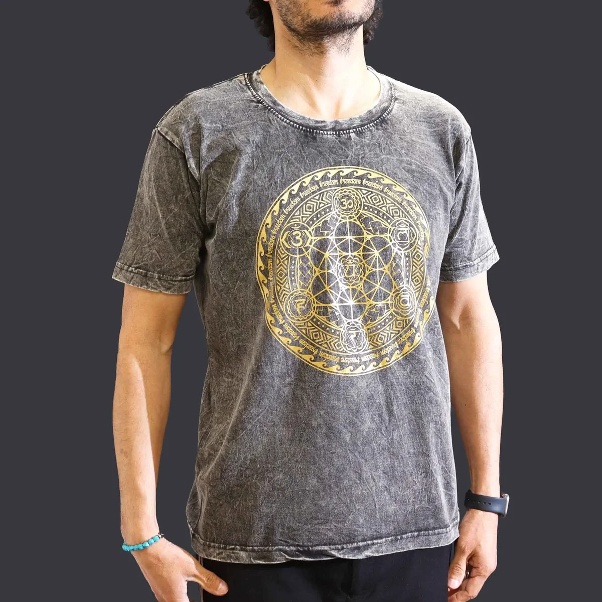 Medium dark grey t-shirt with stone washed texture and chakra design on front, short sleeves, crew neck style