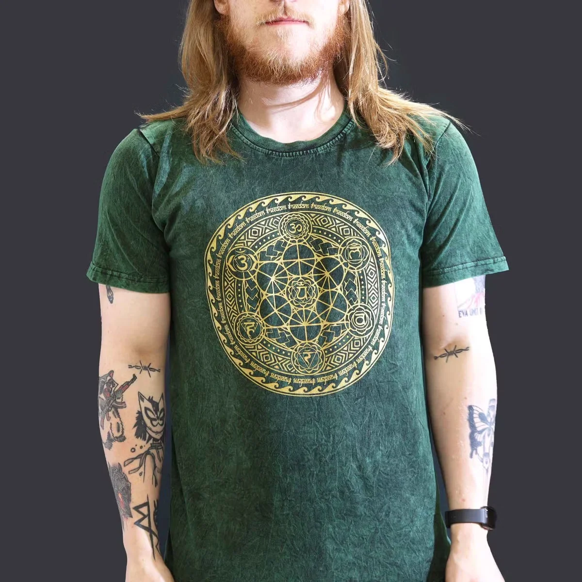 Green large stone washed chakra themed t-shirt with a subtle faded texture, shown flat against a white background