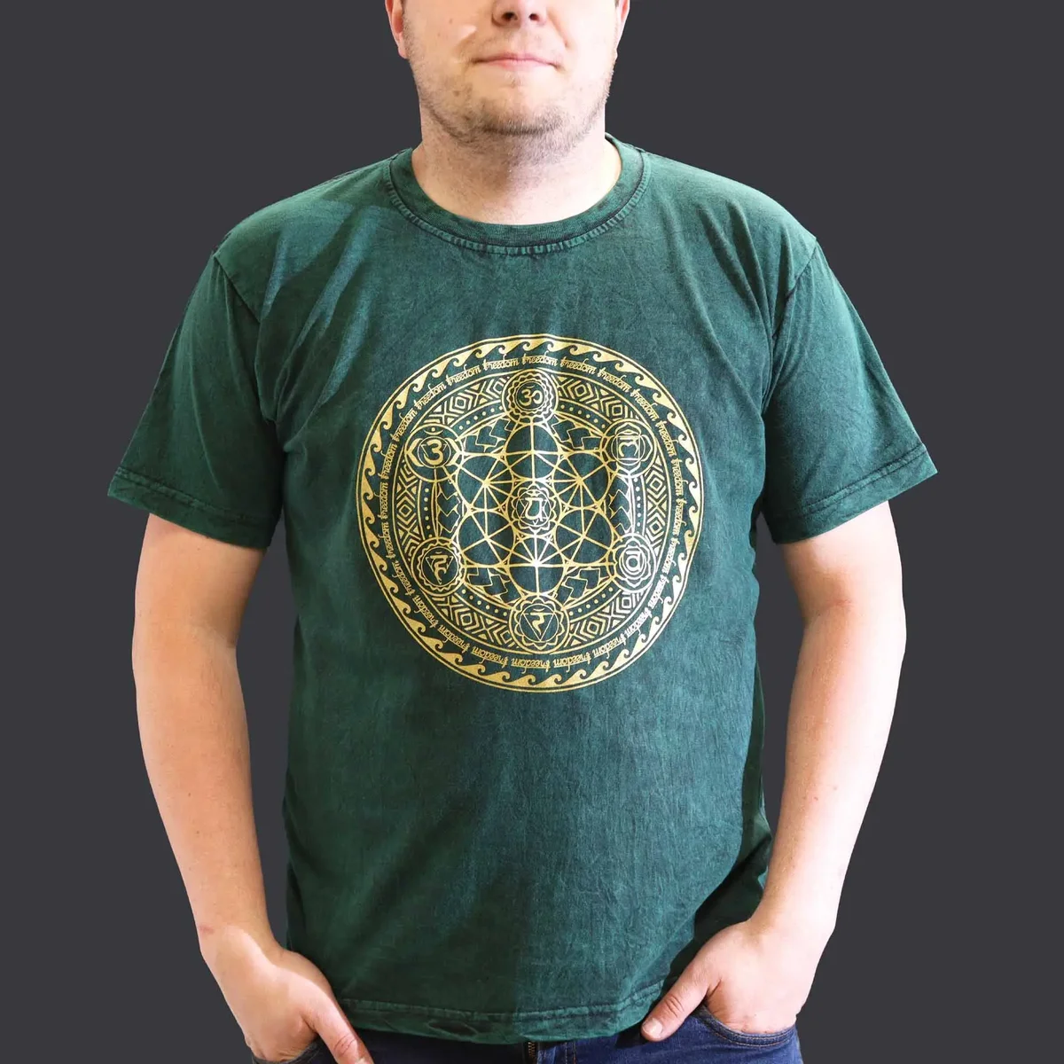 XL green chakra t‑shirt with stone washed finish laid flat.