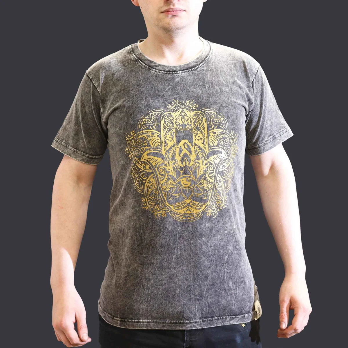 Dark grey small stone washed t-shirt featuring a Hamsa hand design on the front