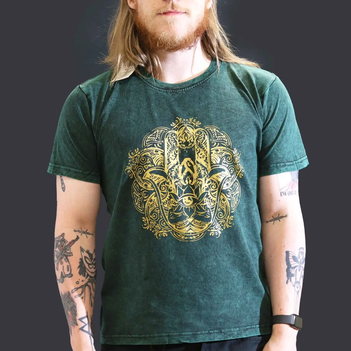 Large t-shirt green with stone washed fabric and hamsa symbol.