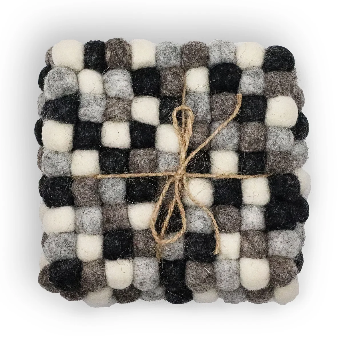 Set of four multi grey felt ball square coasters on a neutral background