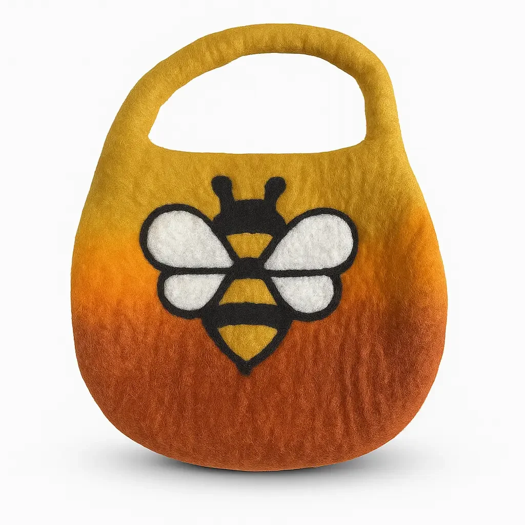 Sunrise orange water felted bee bag with one handle and a magnet, showing its textured felted design.