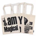 Natural tote bag displayed in a carton box with a mix of 10 assorted designs.